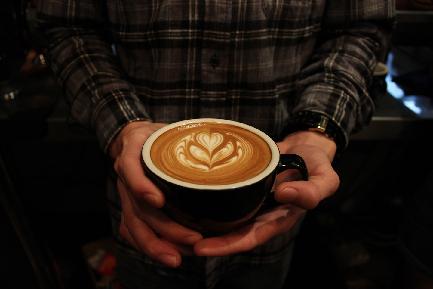 A VCR barista behind the counter